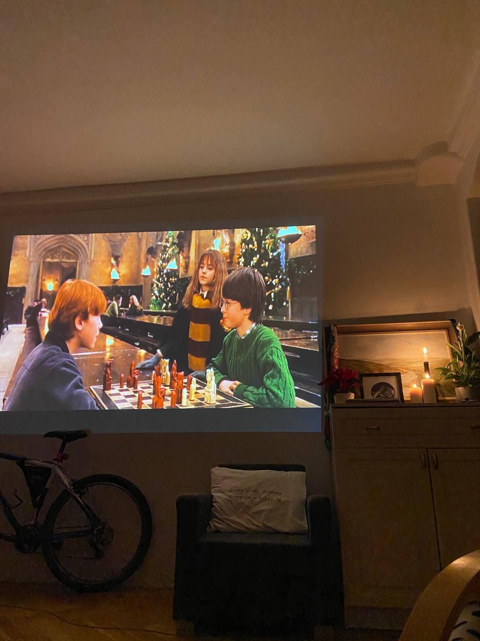 Room with led projector playing Harry Potter